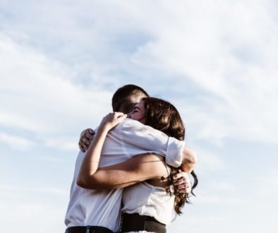 couple embraced in a hug with white skin